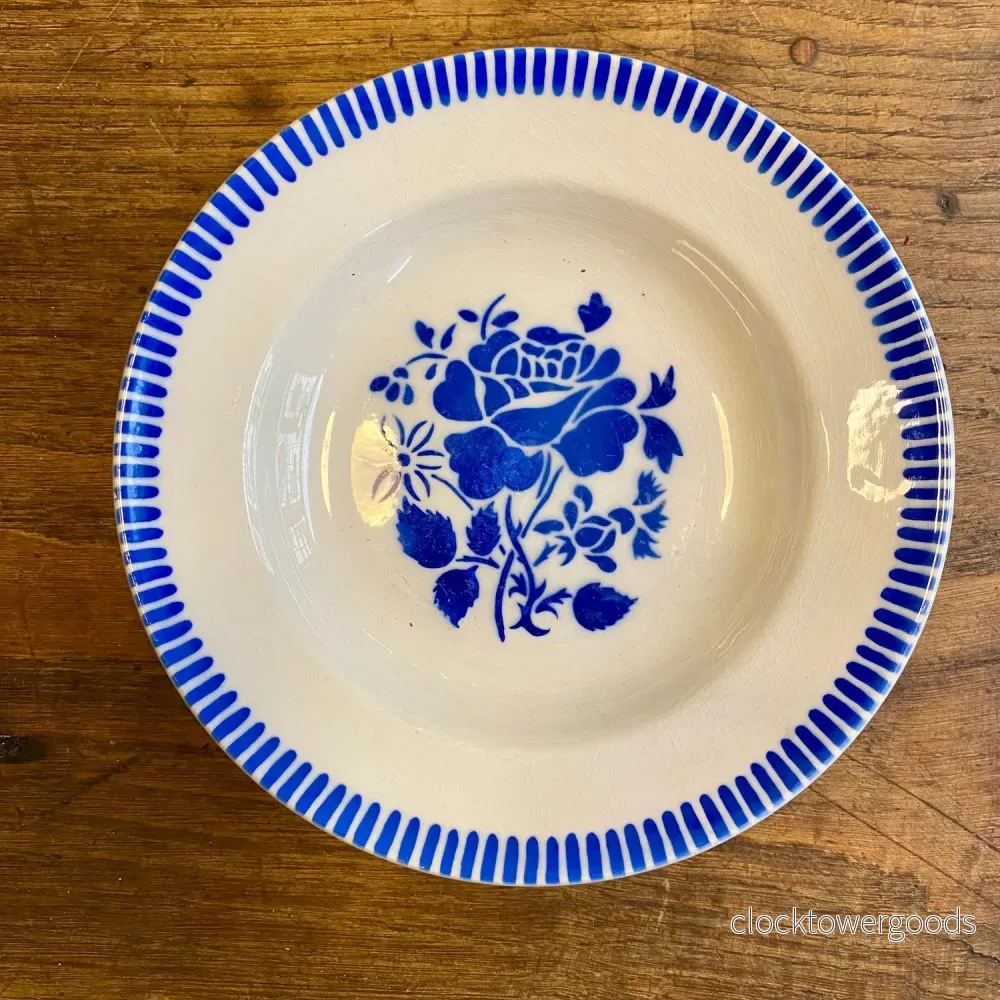 Vintage Lunéville “Evian” Shallow Bowl – Blue Floral Vintage Lunéville “Evian” Shallow Bowl – Blue Floral